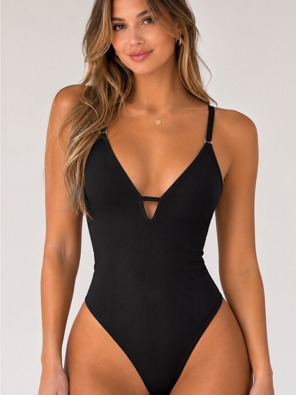 Free People Black Ribbed Deep V One-Piece bodysuit